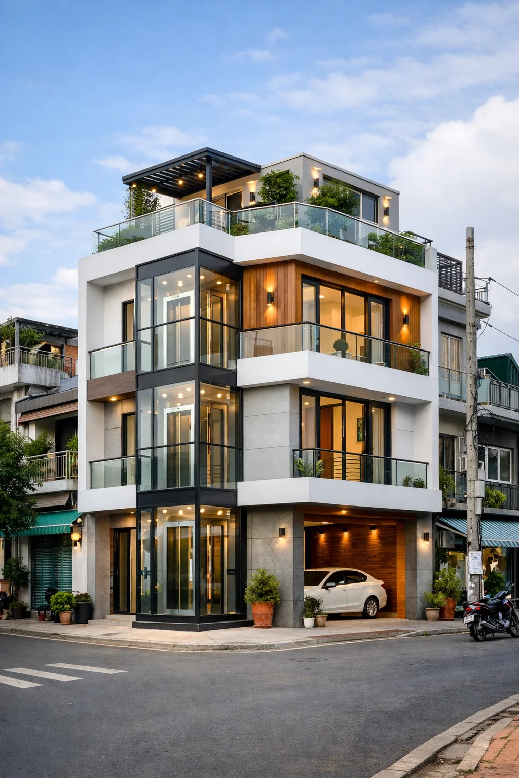 nhà lô góc lắp thang máy 2 cửa vuông góc công trình hoàn thiện